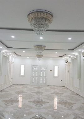 Completed villa reception with marble flooring and gypsum ceiling, Qatar